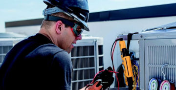 Technician assessing refrigerant project